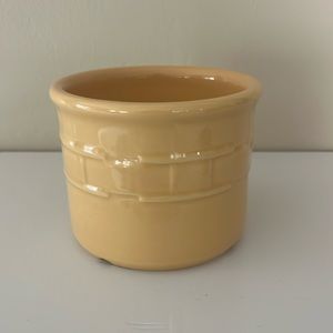 Longaberger small crock with used candle and lid.